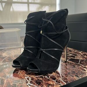 Beautiful high heeled booties. Made by Guess. Suade and leather. Size 7